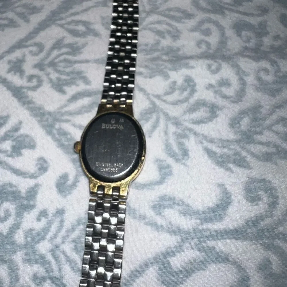 Bulova watch women’s style thin clock gold